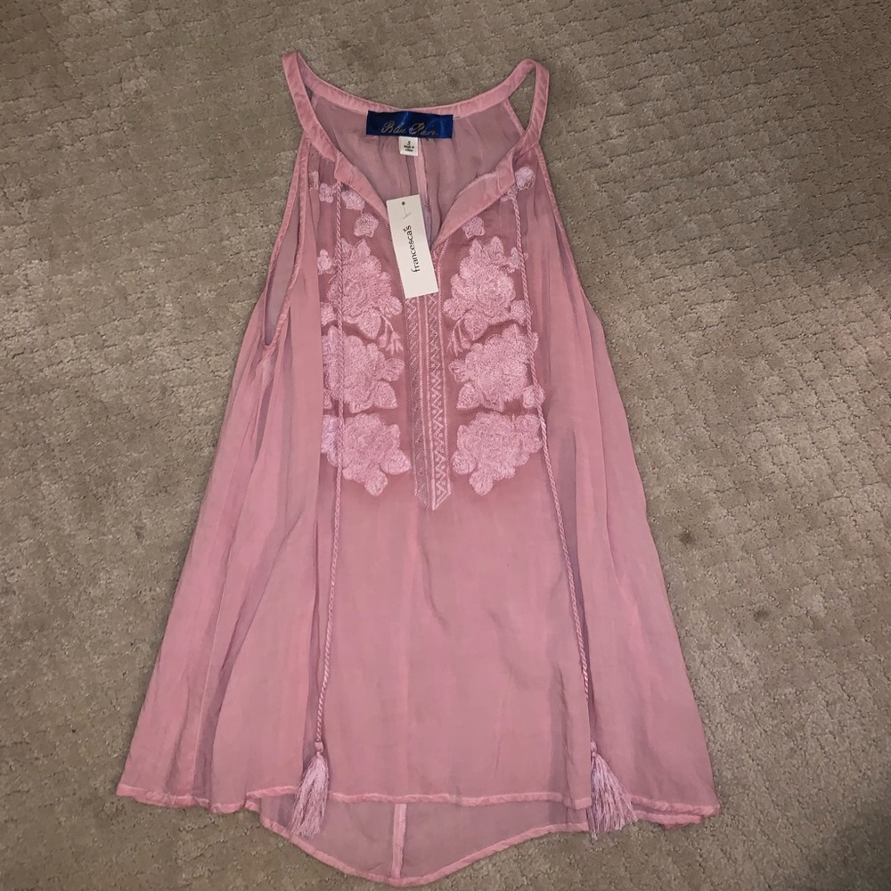 Never worn with tag! Just not my style anymore!